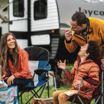 Family camping near Jayco travel trailer